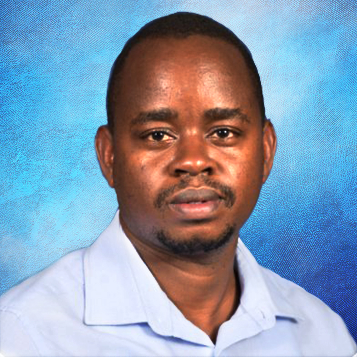 Portrait of Dr Justus Simba